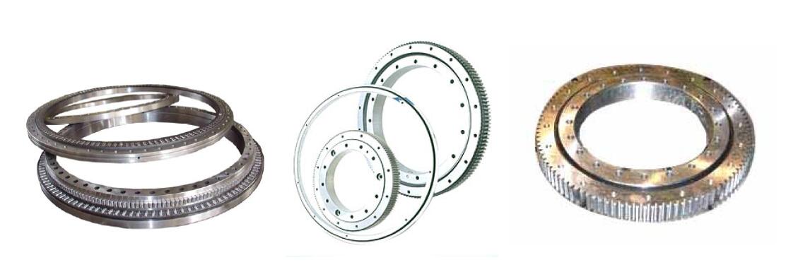 Mesa girat&oacute;ria de anel girat&oacute;rio com engrenagem esf&eacute;rica de contato de quatro pontos de pequeno di&acirc;metro com an&eacute;is deform&aacute;veis